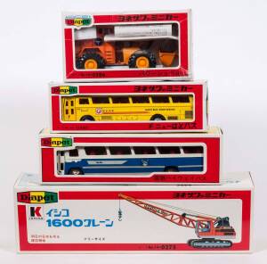 YONEZAWA TOYS: Group of Model Cars and Trucks Including Mitsubishi Fuso Bus (266); And Ishiko Crane (275); And, Digger Truck (206). Most mint in original cardboard packaging. (30 items approx.)