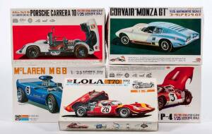 Group of Miscellaneous Racing Car Hobby Kits Including Okamoto: McLaren M6B GP Series (3); And, Eidai: Ferrari P-4 Grand Prix Series 3 (203-200); And, OKAMOTO: Lola T70 Grand Prix Series (1). All mint and unbuilt in original cardboard packaging. (5 items)