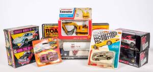 Group of Miscellaneous Model Cars Including GRIP: Porsche 930 Turbo (2); And, MODEL POWER: Fire Engine; And, KIDCO: Road Baron Semi-Trailer (106). Most mint, all in original cardboard packaging. (30 items)