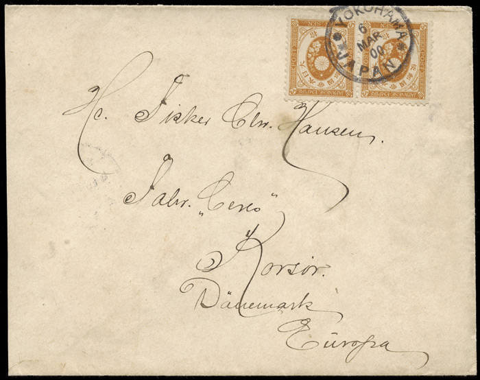 1900 (Mar.6) Koban 10s brown horiz. pair used on cover from Yokohama to Denmark; posted on board a Danish ship with mss endorsement and transit marks of Korsor and Slagelse on reverse.