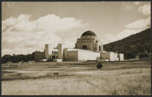 Aust Capital Territory: Canberra: ‘Australian War Memorial, Canberra’ real photo postcard (RC Strangman photo) of the newly-completed building surrounded by grass fields, unused, fine condition.