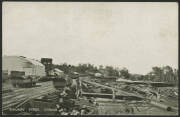 Northern Territory: Darwin: 'Railway Yards, Darwin, NT' postcard showing Railway Sidings, Water Tower, Goods Sheds & Goods Wagons, unused, fine condition.