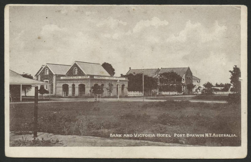 Northern Territory: Darwin: ‘Bank and Victoria Hotel Port Darwin NT’ postcard showing the Commercial Bank building & hotel in background, unused, couple of minor blemishes.