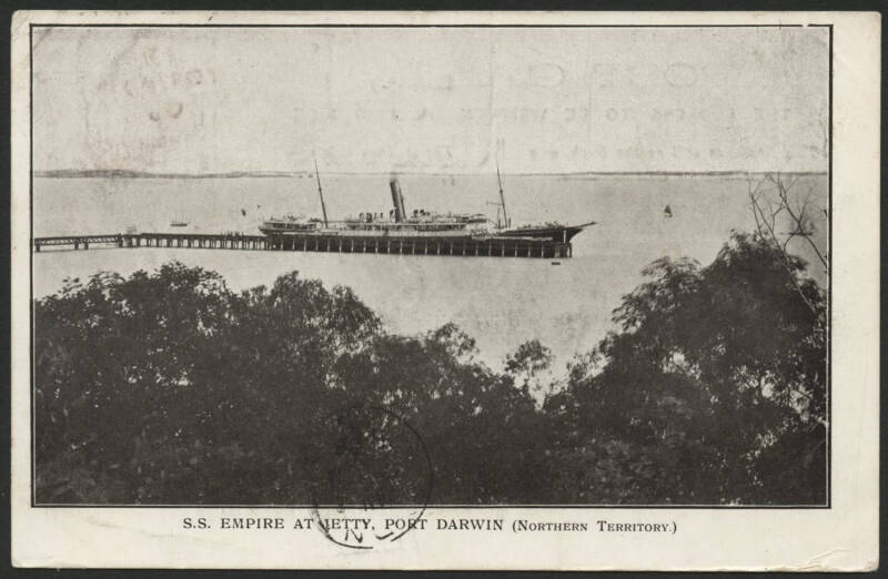 Northern Territory: Darwin: ‘SS Empire at Jetty, Port Darwin’ postcard showing the Eastern & Australian Steamship Company Ltd.'s steamship sent to Victoria with message including "... still very hot here we leave here early tomorrow ..." and South Austral