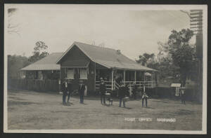 Queensland: Nanango: ‘Post Office Nanango’ real photo postcard (‘Empire’ back) with group of men - some carrying parcels - standing in front of the wooden building with large verandah and corrugated iron roof, unused, fine condition.