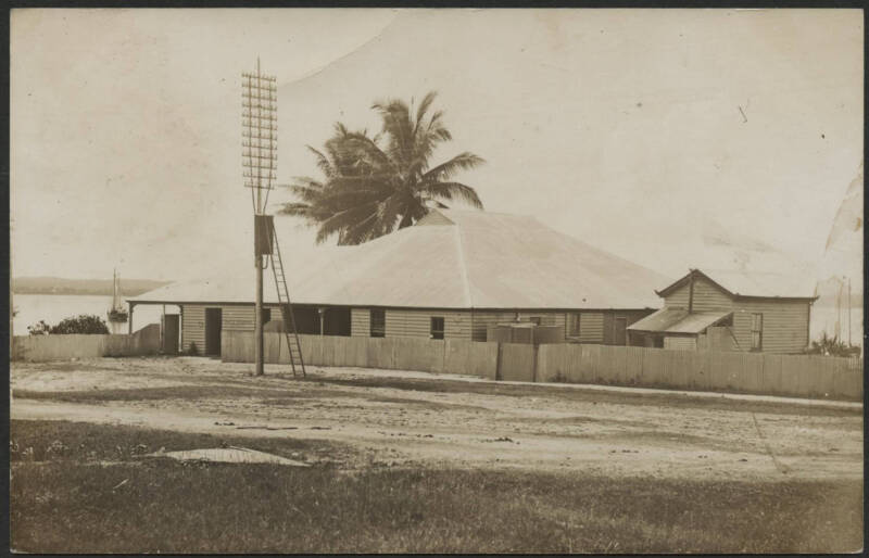 Queensland: Thursday Island: real photo postcard (Empire back) showing Post & Telegraph Office sent to Sydney endorsed from sailor on board "SS Embling" cargo ship with QV 1d orange tied ‘THURSDAY ISLAND/MY18/08/QUEENSLAND’ cds, very minor bend otherwise