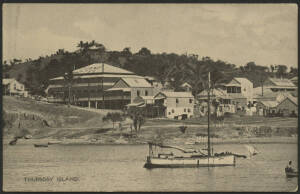Queensland: Thursday Island: ‘Thursday Island’ postcard with Grand Hotel, township and Pearling Lugger boat in Harbour in foreground, unused, couple of blemishes.