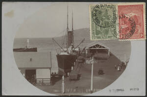 Tasmania: Burnie: real photo card (W Fairhall photo) showing Steamship docked at Burnie Wharf with Railway Wagons & Warehouse sent to Austria with Pictorials 1d red and ½d green tied ‘WARATAH/MY6/10/TASMANIA’ cds, couple of minor blemishes.