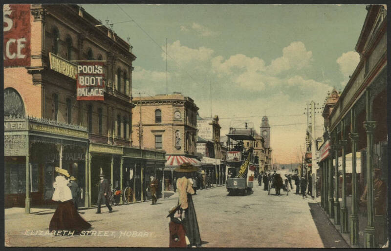 Tasmania: Hobart: ‘Elizabeth Street’ card (published by J. W. & S. Ltd, Hobart) with storefronts including Pool's Boot Palace & J. Warner Wholesale Confectioner and double-decker tram and pedestrians, used under cover with message on back, fine condition.