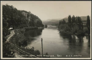 Tasmania: New Norfolk: ‘River Derwent near New Norfolk’ real photo card (D.I.C. photo) with Railway Line running alongside the Derwent River and Railway Station in background, unused, fine condition.