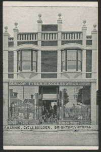 Victoria: Brighton: ‘FA Crook, Cycle Builder, Brighton’ postcard showing shopfront with Bicycles in window & doorway and advertising for Dunlop tyres and accessories, unused, fine condition.