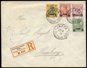 1902 (Apr.17) 20 para on 10pf red envelope uprated with 10p, 20p & 1 1/4 pia stamps (Mi.12,13 & 15), cancelled with Jaffa cds's plus "Deutsches Postamt Jaffa" reg. label, to Hamburg. Hamburg arrival b/stamp. Very fine.