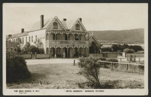 Victoria: Dromana; ‘Hotel Dromana, Dromana’ real photo postcard (Rose series P1011) showing front view of the hotel building with verandah & balcony, sent to Estonia(!) with KGV 2d red tied ‘DROMANA’ cds and ‘TALLIN/16V27/EESTI’ arrival d/s alongside, fin