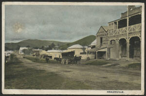 Victoria: Healesville: postcard showing Tevlin's Rathrone House Hotel and Boarding House and Mitchell Produce and Mills store alongside with horse and wagon in Nicholson Street (now Maroondah Highway) and township in background, QV 1d pink tied barred num