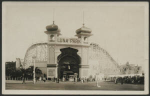 Victoria: St Kilda: real photo postcard showing the iconic Luna Park ‘Big Mouth’ entrance with Admission Charges ‘Adults 6d/Children 3d’ sign, Admission Kiosk and the ‘Scenic Railway’ roller-coaster, used under cover with note dated “11/1/25” on back, fin