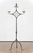 A Spanish wrought iron twin branch candle stand, 16th-18th century