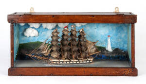 A Victorian diorama, English 19th century; of a four masted ship under sail in glass case. 31cm high, 64cm wide.