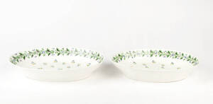 A pair of Derby porcelain ovoid dishes, English early 19th century decorated with corn flower sprigs