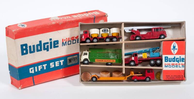 BUDGIE: Late 1950s to early 1960s commercial vehicles Gift Set (5A) consisting of Log Carrier, Bulk Flour Carrier, Tower Class Carrier, Crane and Fire Ladder Truck. All mint in original red, white and blue lift off cardboard box with correct packing piece