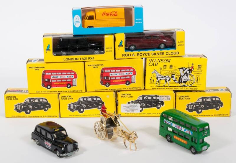 BUDGIE: 1960s group of ‘B & C Series’ Model Cars including ‘Mikansue’ London Taxi Cab (101) – Black; and, London Routemaster Bus (236) – Green; and, Hansom Cab (100) – Gold with red figure. All mint in original yellow or blue cardboard boxes. (10 items)