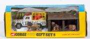 CORGI: Late 1960s to early 1970s Lions of Longleat Gift Set (GS8) &ndash; Zebra Print Land Rover with Yellow Cage and plastic figures of Lions, Lions den and Tamer. Mint in original yellow and blue windowed box with original polystyrene packing pieces. Slight d