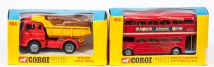 CORGI: Late 1960s to Early 1970s Pair of Commercial Vehicles Consisting of London Transport Routmaster bus (468) – Red with ‘Outspan Oranges’ Sticker; And, Bedford Tipper Truck (494) – Red with Yellow Tipper and Cardboard Display Load.  All mint in origin