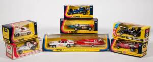 CORGI: Late 1970s to early 1980s group of model racing vehicles Including Team Corgi Powerboat Team Jaguar XJS with Speed Boat (38); and, John Player Special Lotus (154); and, STP Patrick Eagle Indianapolis Racing Car (159). All mint in original striped c