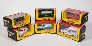 CORGI: 1980s Group of Model Vehicles including Ford Transit Milk Van (405); and, ‘British Gas’ Ford Escort (499); and, ‘Yorkshire Post’ Bus (Special Limited Edition). Most mint, all in original cardboard packaging. (30 items)