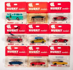 HUSKY (CORGI JUNIOR): Late 1960s group of model car blister packs Including Luggage Elevator (32) – White and Green; and, Farm Trailer and Calves (33) – Green; and, Citroen Safari (2) – Gold with Detachable blue Plastic Boat. All mint and unopened in orig