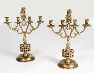 Pair of brass 4 branch candelabra with lion finial, 20th century. 54cm