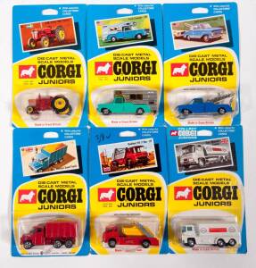 CORGI JUNIORS: Late 1960s to early 1970s group of Model Cars consisting of Ford Breakdown Truck (28) - Blue; and, B.M. Volvo 400 Tractor (34); and, Simon Snorkel Fire Engine (36). All mint and unopened in original yellow and blue blister packs. (40 items 