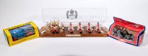 CRESCENT: Group of Model Vehicles Consisting of 1977 The Queen Silver Jubilee Royal Stage Coach (302); And, Army 25 PDR Light Artilery Gun (1250); And, Dexta Tractor (1809). All in original perspex display case/cardboard windowed box. Note there is some d