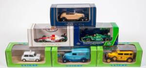  ELIGOR: 1:43 Group of Model Cars Including 1965 Mini 850 (1110) – Blue; And, 1929 Mercedes Benz Limousine ‘Nurburg’ (1043) – Yellow; And, Ford LH 94 Larrousse (Larrousse F1) - Kronenbourg Red White and Green. All mint in original perspex display case. (3