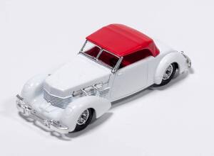 MATCHBOX: ‘Models of Yesteryear’ 1937 Cord Model 812 Convertible Pre-production Trial Model (Y18) - white body, red plastic roof & seats, white base with incomplete copyright date and lacking model number cast and chrome 24-spoke wheels. Near mint and unb