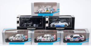 MINICHAMPS: 1:43 group of BMW Model Cars consisting of 1999 BMW V12 LMR 24h Le Mans (992917); and, 1994 BMW 318 IS (942301); and, 1992 BMW M 3 DTM Macau GP (22004). All mint in original display cars. (32 items)