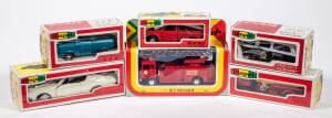 YONEZAWA TOYS: Group of Model Cars and Trucks including Nissan Taxi (84-0321); and, Medical Bus (11-0232); and, Kawasaki 650 W1 Special (234). All mint in original cardboard windowed boxes. (75 items approx.)