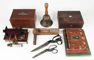 Antique brass bell; rosewood box; antique shock machine; wooden "clacker".