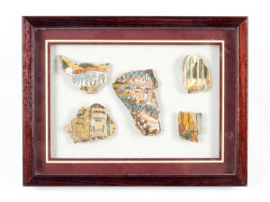 Egyptian fragments of painted cartonnage from a sarcophagus, New Kingdom period, 1550-1070 B.C; various dimensions, in glazed display frame.Provenance: B.C. Galleries, Sydney