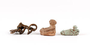 An Ashanti bronze gold weight, 6cm high; together with two Ptolemaic faience amulets 3rd century BC, 2.25 and 3.75cm high. (3 items).