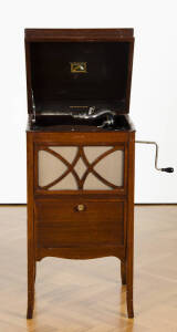 H.M.V hand-cranked consoled gramophone in walnut case circa 1929. 45 x 43 x 87cm