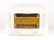 ASTOR MICKEY: White Bakelite mantle radio.