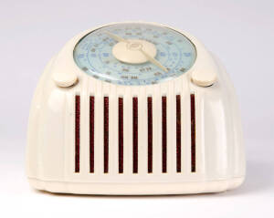HEALING BATHROOM SCALES: Cream Bakelite mantle radio circa 1952.