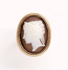 CAMEO RING: Early 19th century gold ring set with cameo portrait.