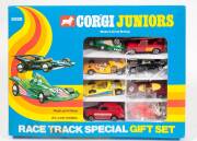 CORGI JUNIORS: 1970s Gift Sets Consisting of Race Track Special Gift Set (3028) – Containing 7 Vehicles as well as Plastic Figures. All mint in original yellow and blue windowed boxes. Slight damage to the box with the cellophane being broken.