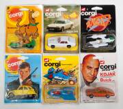 CORGI JUNIOR: Group of 1980s Cartoon and TV Model Cards Blister Packs Including James Bond 007 Space Shuttle (41); And, Yogi Bear Car (82); And, The Incredible Hulk Bike (100). All mint and unopened on original cardboard cards. (80 items approx.)