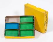 DINKY: 1940s to 1950s 4-wheel Hand Truck Trade Pack of 6 (105C/383) – Contains Four Green with Yellow Hubs and One Blue with Yellow Hubs. Mint to near mint still in superb original trader pack with original dividers. It is missing one hand truck. (5 items