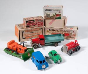 TRI-ANG: Group of Vintage Metal and Plastic Minic Clockwork Model Vehicles Including Series 1 Bulldozer – Orange and Green with Black Tread; And, Austin ‘7’ Saloon – Green; And, Delivery Lorry – Red Cab with Powder Blue Back. All items mint to near mint, 