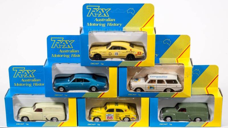 TRAX: 1:43 1980s ‘8000 Series’ Group of Holden Model Cars Including FJ Holden Van (8003) – Blue ‘Wine and Spirit Marchant’; And, Holden Monaro HK GTS (8004) – Red; And, EH Holden Station Wagon (8011) – Dark Brown with White Roof. All mint in two tone yell