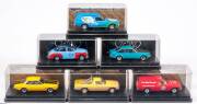 TRAX: 1:43 Group of Holden Model Cars Including 1975 Holden LH Torana G-Pack (TR14G) – Yellow; And, 1976 Holden LX Torana SS Hatchback (TR28F) – Aqua; And, 1980 Holden VC Commodore SL/E Sedan (TR61) – Maroon. All mint in original perspex display case. (33