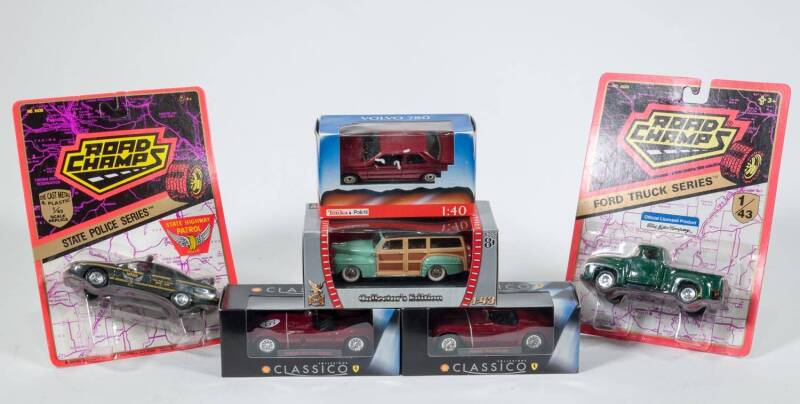 Miscellaneous Group of 1:43 Scale Model Cars Including ROAD CHAMPS: Ford Truck Series (6420) – Green; And, ANSON: Ford Lightning SVT F150 (AN80801) – Red; And, EAGLES RACE: Ford Model T (466000) – Black. All mint in original carboard packaging. (25 items)